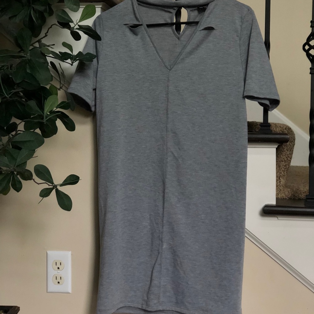 Woman’s grey cut out mini dress